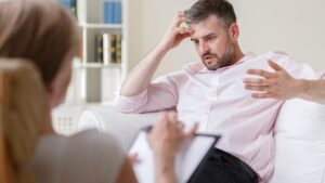 Man in therapy session, showing therapy is for everyone, not just crisis