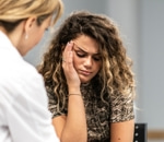 Addiction counsellor comforting a distressed woman during a one-on-one session in Vaughan