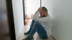 Person reflecting during the grieving process