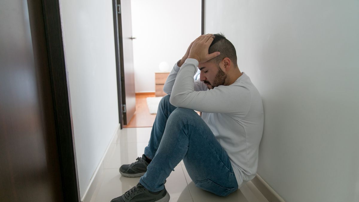 Person reflecting during the grieving process