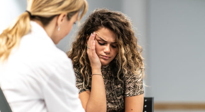 Addiction counsellor comforting a distressed woman during a one-on-one session in Vaughan