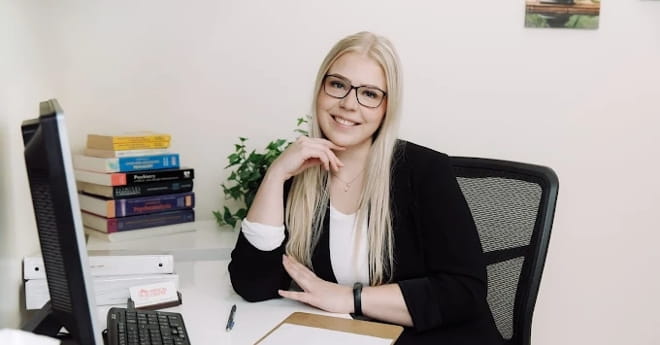 A therapist at her desk in a psychotherapy office in Vaughan