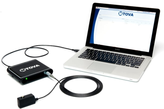 The T.O.V.A. device connected to a laptop running the attention test software