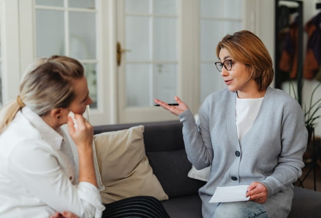 Therapist explaining dialectical behaviour therapy skills to a client during a session