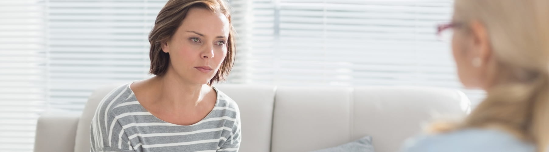 Woman speaking with a therapist during a SAD therapy session in Vaughan