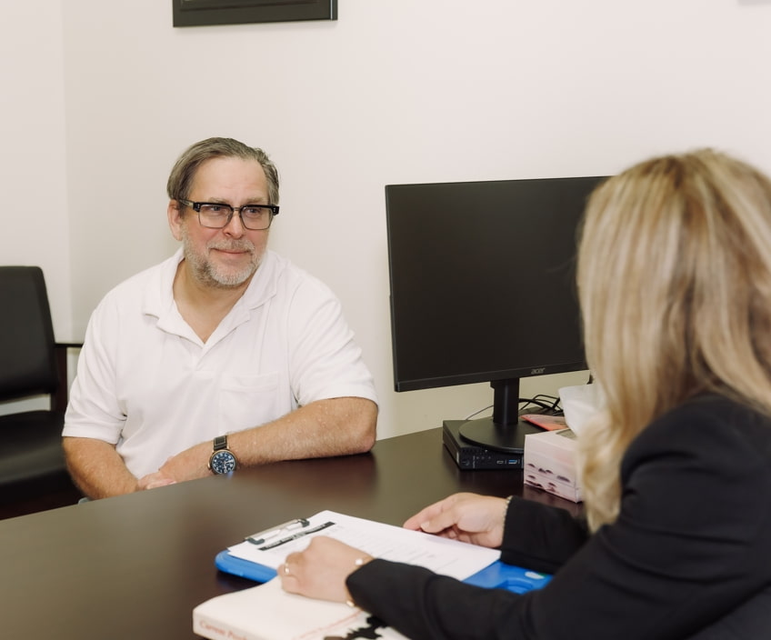 Man at a free 30-minute consultation for men's therapy at the 101 Psychotherapy Vaughan office